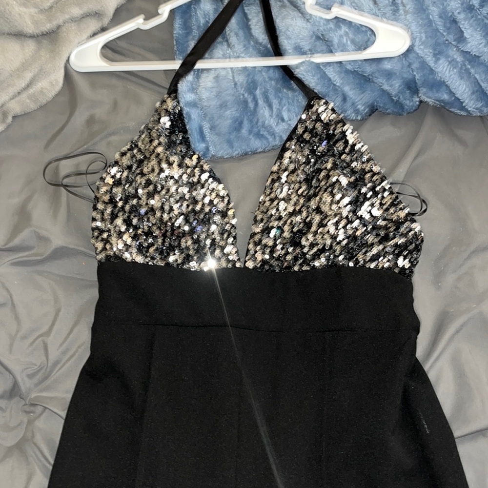 Black pantsuit with a glitter top